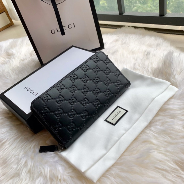 G*u*i leather zip around wallet