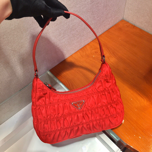Pra*a nylon and saffiano leather mini bag