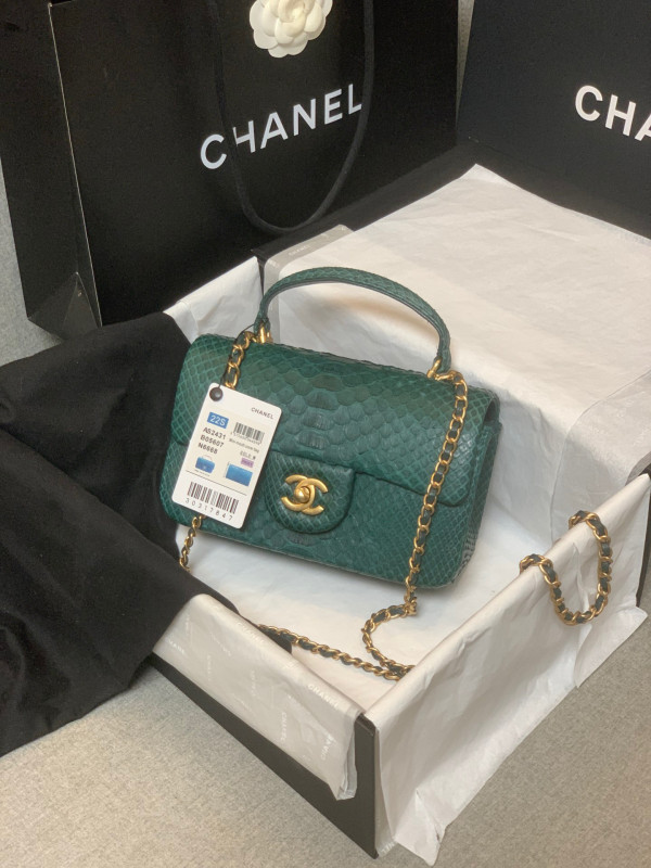 CL MINI FLAP BAG WITH TOP HANDLE