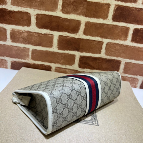 G*u*i ophidia toiletry case