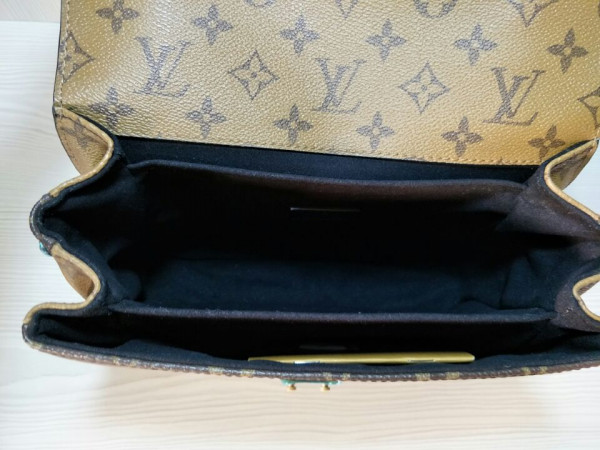 l**is V*t*n pochette metis